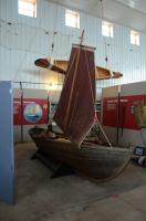 The Norwegian skiff and an Ojibwe canoe by our boatbuilding and winter displays.