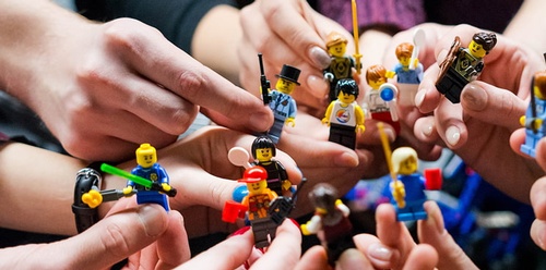 Gallery Image hands-holding-minifigs-event-745x371-1.jpg