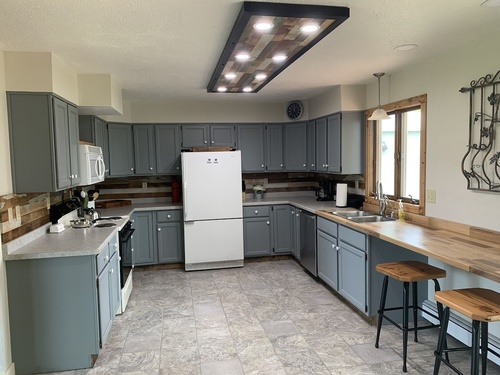 Kitchen w full size appliances. Utensils, cooking & baking needs & table service