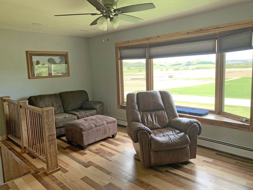  Upstairs living room. Flooring is real wood. Bay window with great valley views! Upstairs living room. Flooring is real wood. Bay window with great valley views!, expand to full screen view Upstairs living room. Flooring is real wood. Bay window with great valley views!