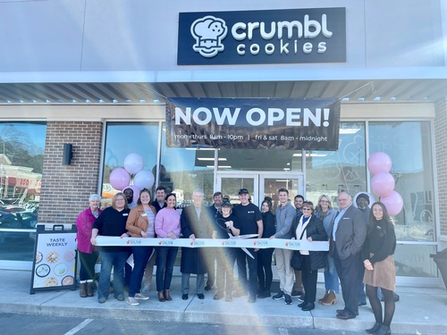 Supporting business by attending the ribbon cutting ceremonies, this one at Crumbl Cookies