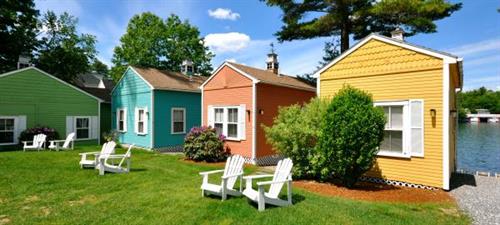 Choose from one of our colorful cottages along the water. 