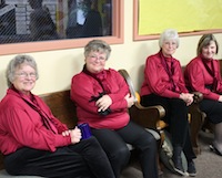 Bell Choir members relax between services