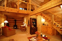 All 18 cabins are equipped with a fireplace, loft-style bedroom and private bathroom.