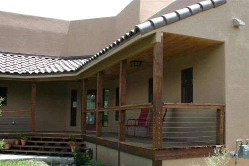 Spanish tile roof with custom redwood deck