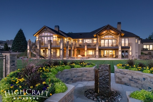 Grand-Waterfront-Retreat-Illuminated-Stone-Fountain-with-Garden-and-Rear-Views